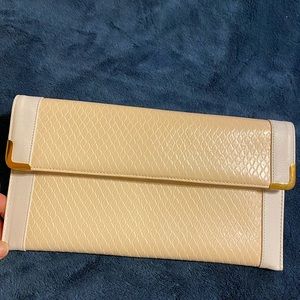 Koret white and cream leather clutch purse.